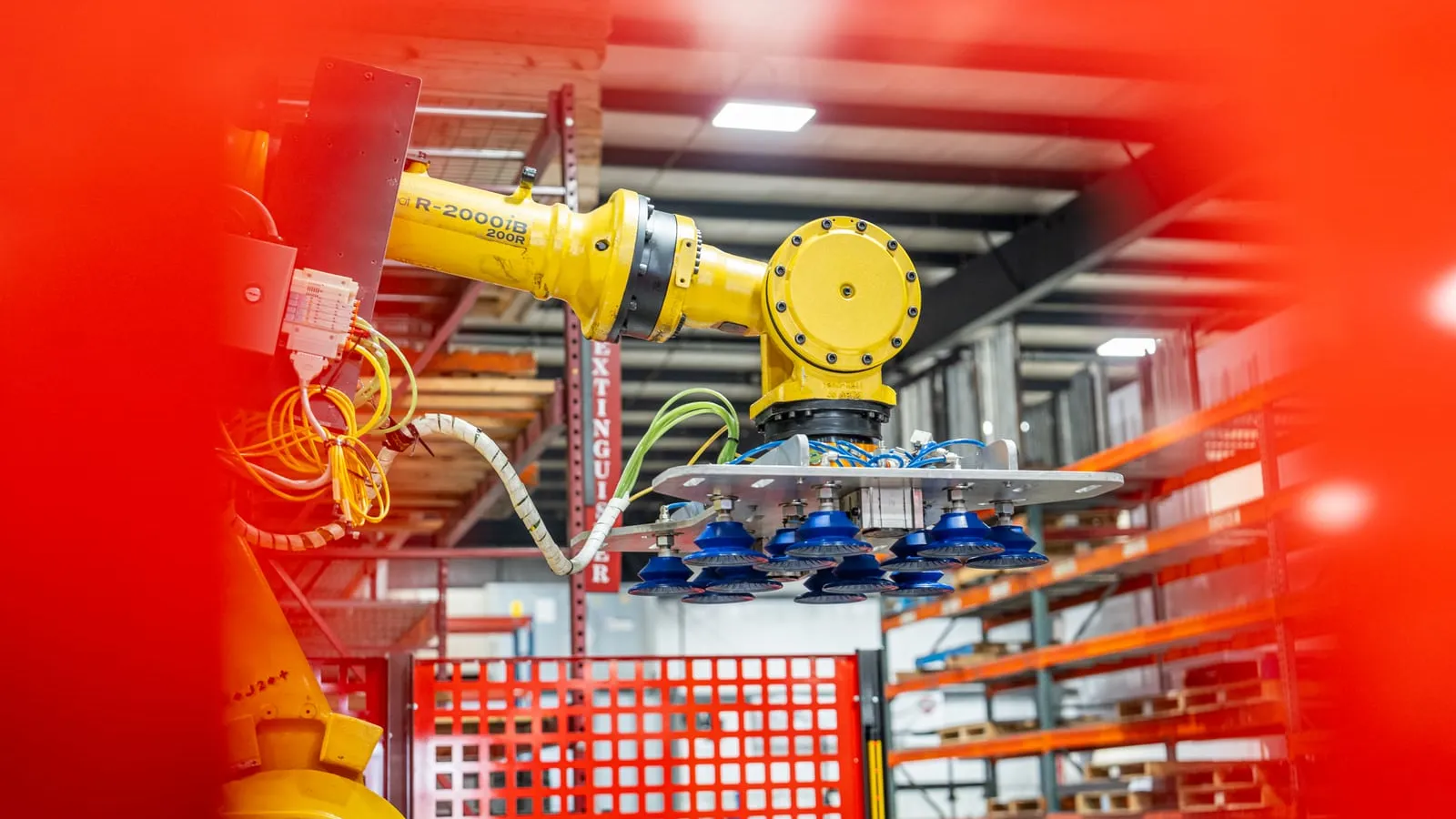 FANUC R-2000iB fitted with a multi-cup vacuum suction gripper designed and built by TWA
